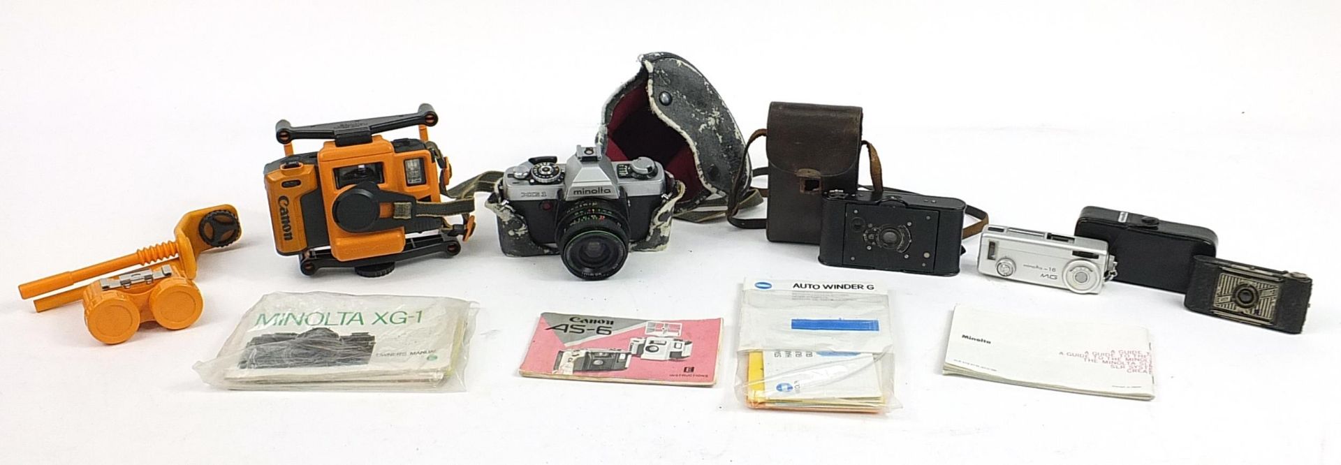 Vintage cameras including Canon AS-6, Minolta XG1 and Minolta-165 camera
