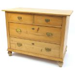 Pine four drawer chest with brass handles, 78cm H x 100cm W x 54cm D