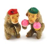 Two vintage Steiff wind up musical monkeys, each approximately 15.5cm high
