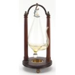 Antique glass barometer on unassociated mahogany and brass stand, 33cm high