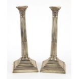Ellis & Co, Large pair of George V silver Corinthian column candlesticks, Birmingham 1914, each 32.