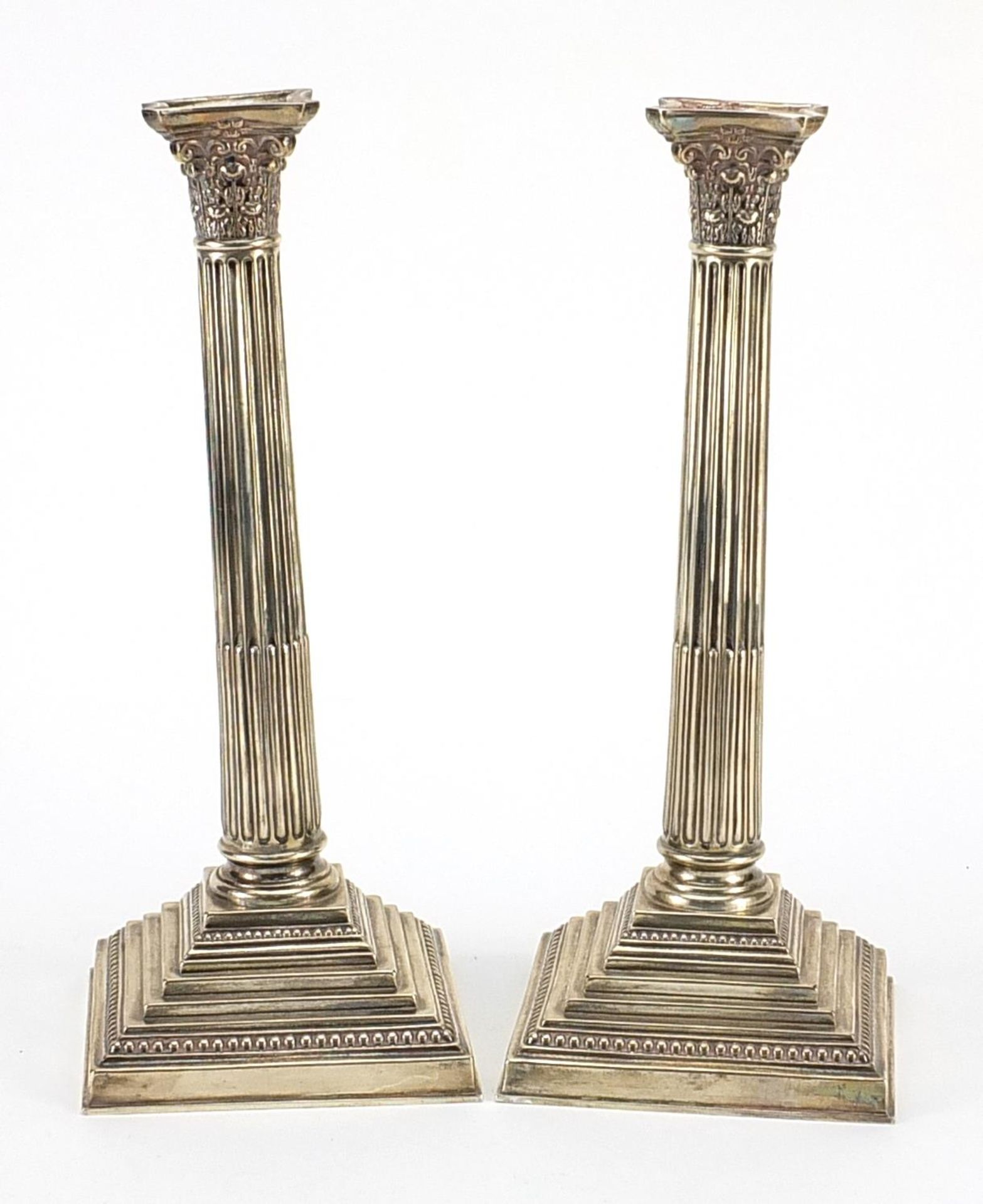 Ellis & Co, Large pair of George V silver Corinthian column candlesticks, Birmingham 1914, each 32.