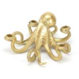 Gilt octopus design four branch candlestick, 30cm wide