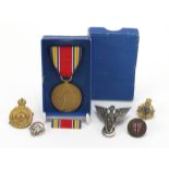 Military interest badges and American World War II medal including For Service at the Front and