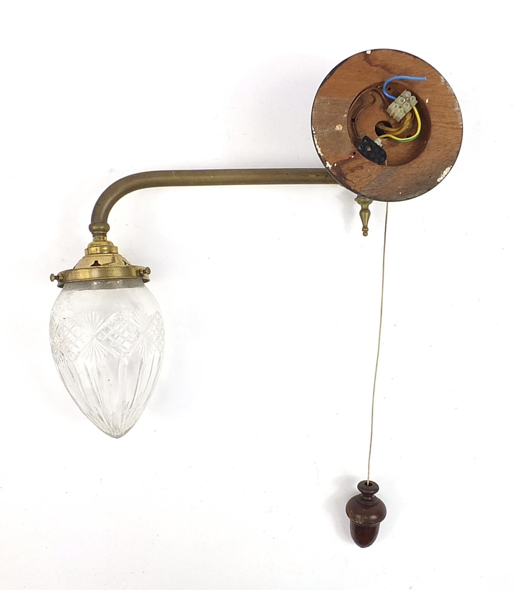 Art Nouveau brass wall light with cut glass shade and mahogany acorn design pull switch, 38cm wide - Image 2 of 3