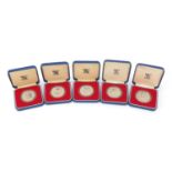 Five silver proof 1977 commemorative crowns with cases