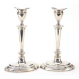 Alexander Clark & Co Ltd, pair of George V silver candlesticks, Sheffield 1928, 24cm high, 1215.0g
