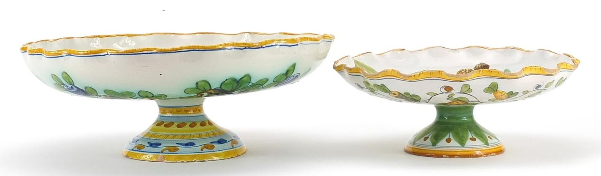 Cantigalli, two Italian Maiolica pedestal dishes hand painted with leaves and berries, the largest