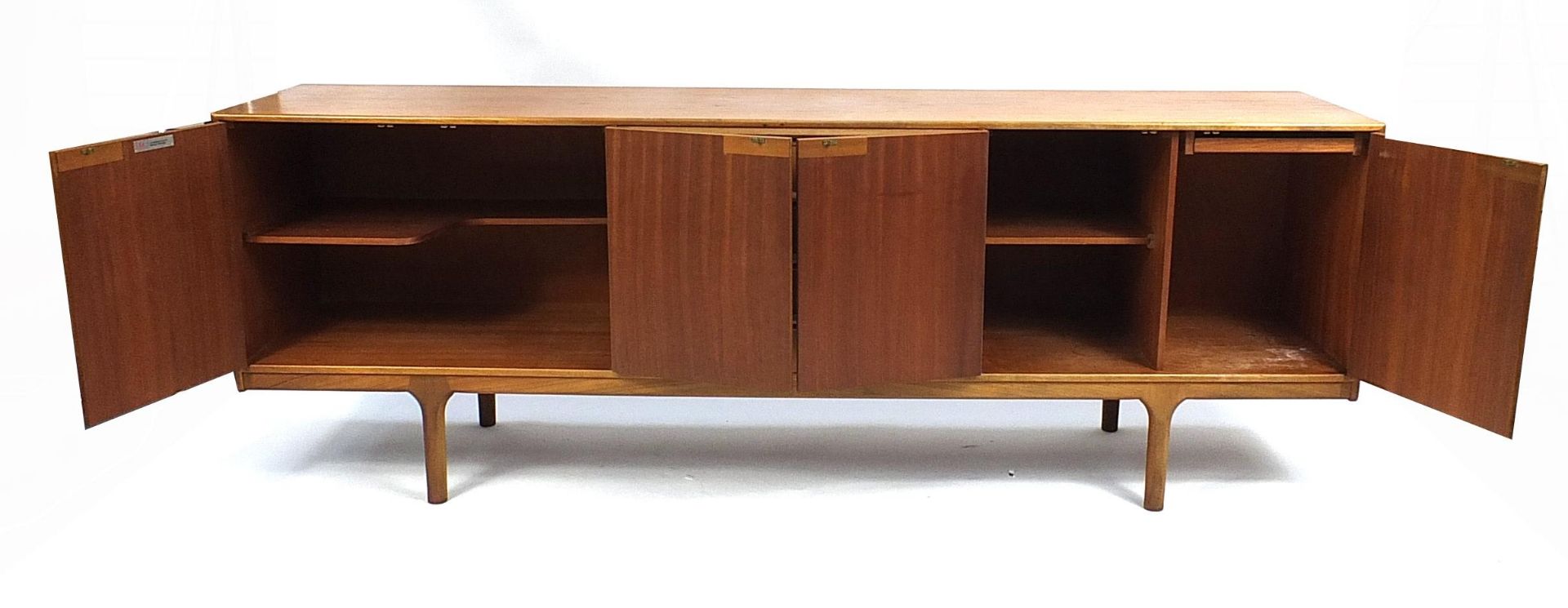 A H McIntosh & Co Ltd teak sideboard fitted with two pairs of cupboard doors and four central - Image 2 of 4