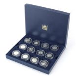 Twelve Coronation Jubilee silver proof fifty pence pieces with fitted case