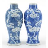 Pair of Chinese blue and white porcelain baluster vases hand painted with prunus flowers, four