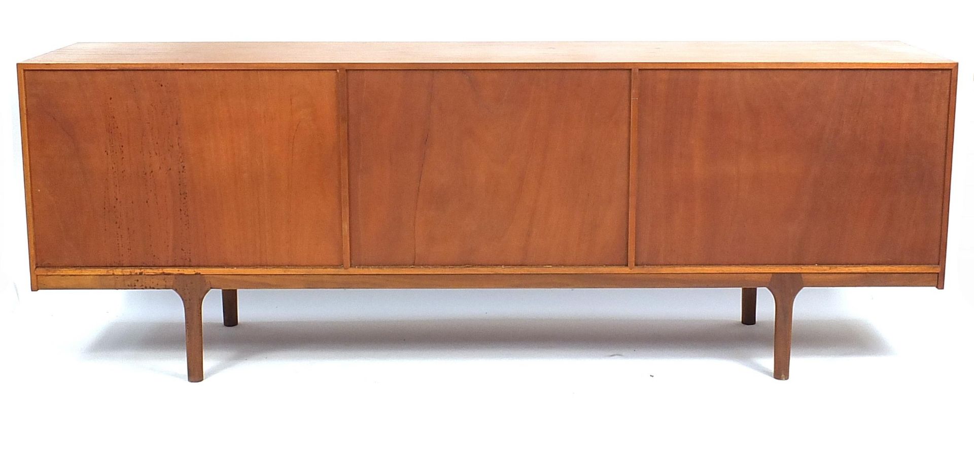 A H McIntosh & Co Ltd teak sideboard fitted with two pairs of cupboard doors and four central - Image 3 of 4