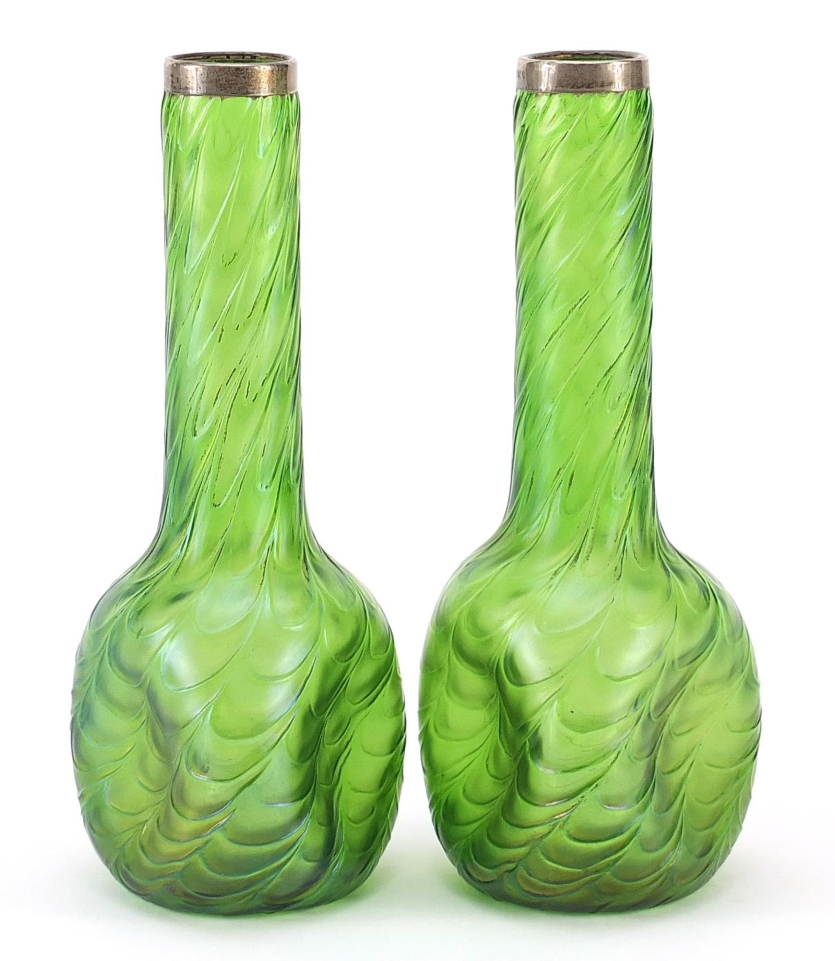 Pair of Art Nouveau green iridescent glass vases with silver rims in the style of Loetz, each 19.5cm