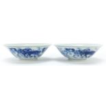 Pair of Chinese blue and white porcelain bowls hand painted with horses, six figure character