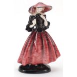 Goldschneider, Czechoslovakian Art Deco pottery figurine of a female wearing a floral dress,