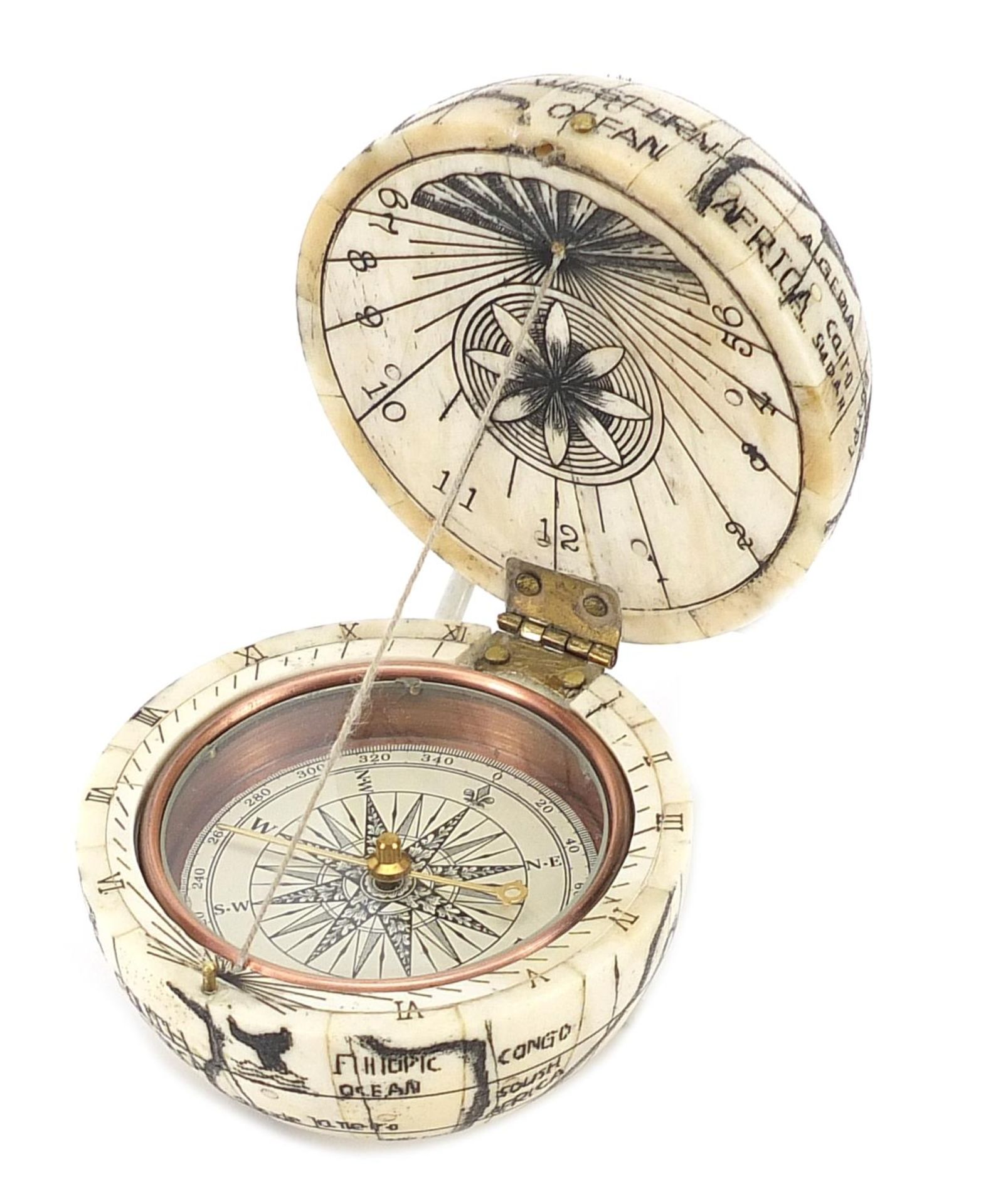 Naval interest carved bone pocket globe and compass, 7cm in diameter