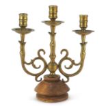 Venetian style bronzed three branch candelabra, 28cm high