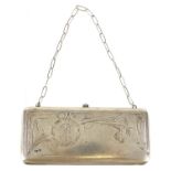 Rectangular silver concertina purse with cabochon pink stone push button, impressed Russian marks,