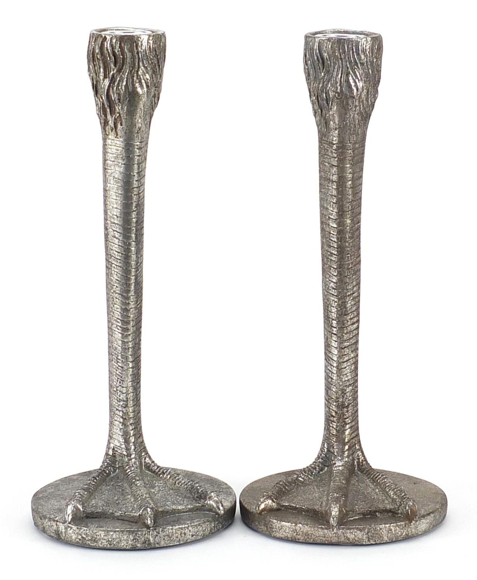 Pair of silvered metal bird feet design candlesticks, 25cm high