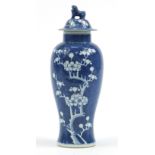 Chinese blue and white porcelain baluster vase and cover hand painted with prunus flowers, 32cm high