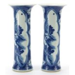 Pair of Chinese blue and white porcelain vases hand painted with panels of landscapes, blue ring