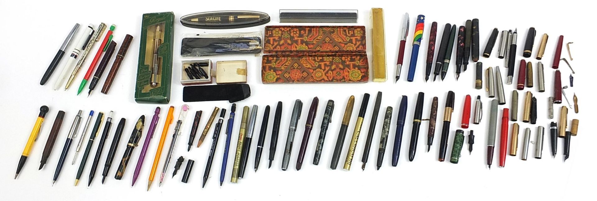 Collection of vintage fountain and ballpoint pens and accessories including Watermans, brown ripple,