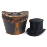 Early 20th century J T Ogdens top hat with leather case, the interior of the hat 19.5cm x 15.5cm