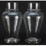 Pair of 19th century apothecary baluster glass vases, each 32.5cm high