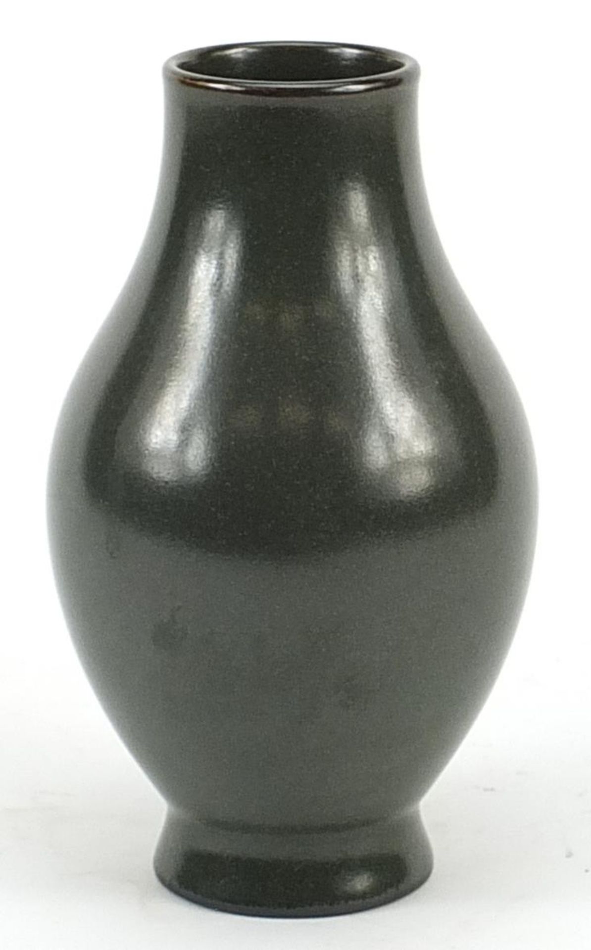 Chinese porcelain vase having a tea powder glaze, six figure character marks to the base, 16cm high