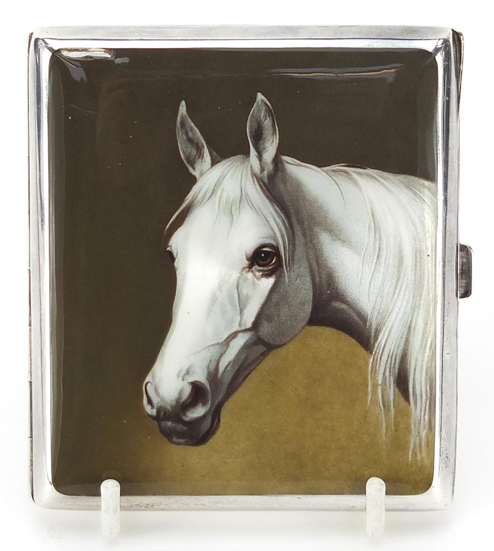 900 silver and enamel cigarette case depicting a horse head, 9cm x 8cm, 147.0g