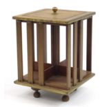 Miniature mahogany revolving bookcase with brass inlay and mounts, 34cm high