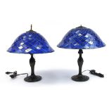 Pair of Tiffany style bronzed table lamps with leaded glass shades, each 46cm high