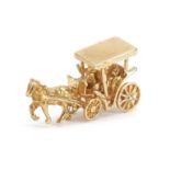 9ct gold horse and hansom cab charm, 3cm in length, 6.3g