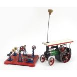Vintage Mamod steam tractor and workshop unit stand