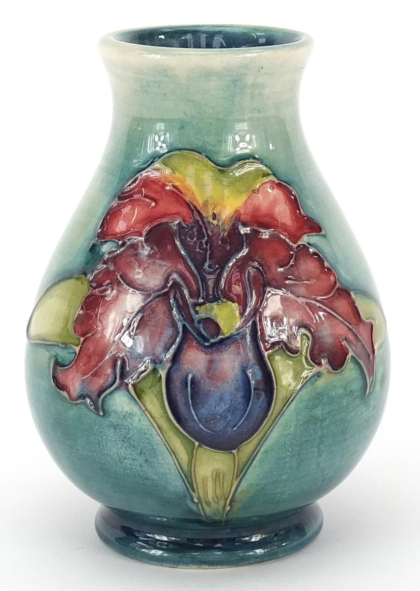 Moorcroft Pottery baluster vase hand painted with two flowers, paper label to the base, 10cm high