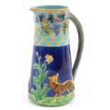 Westhead and Moore, Victorian Majolica jug decorated in relief with two foxes and berries, lozenge