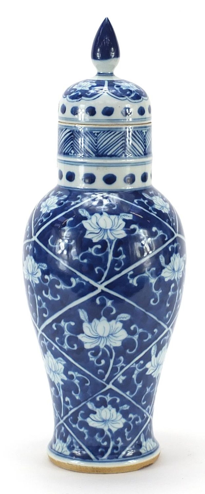Chinese blue and white porcelain vase and cover hand painted with flowers, blue ring marks to the