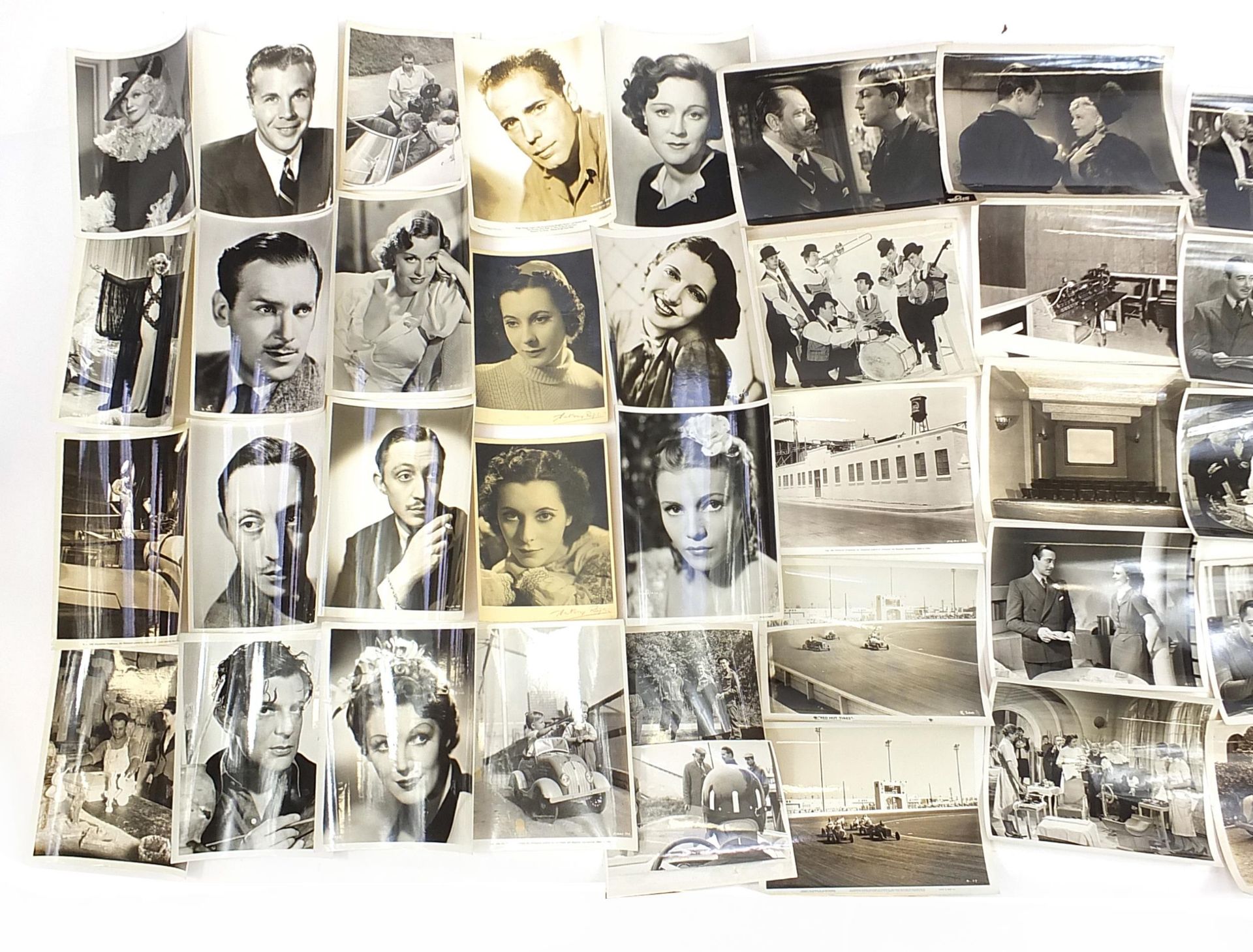 Collection of film stills and photographs of actors from the 1930's, some with stamps to the - Image 2 of 3