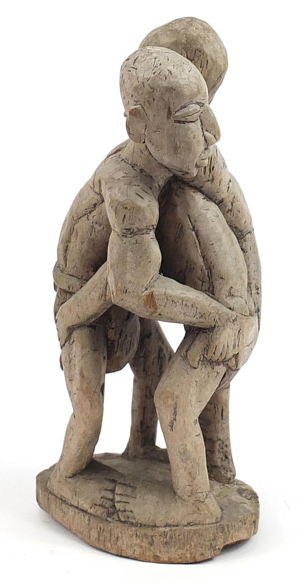 Tribal interest wood carving of two tribesmen wrestling, 40cm high - Image 2 of 3