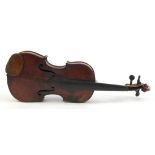 Old wooden violin with case bearing a Nicolaus Amatus Fecit paper label to the interior dated