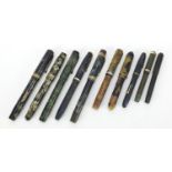 Ten vintage fountain pens with gold nibs, some marbleised including Watermans and Conway Stewart