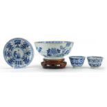 Chinese blue and white porcelain comprising a bowl on stand, two tea bowls and one saucer, the tea