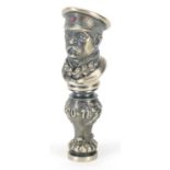 Silver desk seal in the form of a Russian officer in uniform set with clear stones and a ruby,