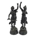 Large pair of patinated spelter figurines, 59cm high