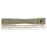 Vintage Edgar Sealey 'Octofloat' three piece cane fishing rod with case, approximately 330cm in