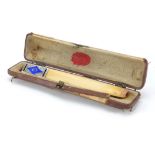 Art Deco Savoy ivory and silver blue guilloche enamel cigarette holder, 935 and makers hallmarks,