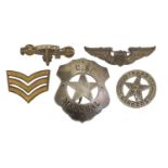 Five United States of America military interest badges including US Marshal, Submarine and Texas