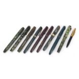 Ten vintage fountain pens with gold nibs, some marbleised including Watermans, Parker and Conway