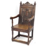 Antique oak open armchair carved with St George and the dragon, 115cm H x 56cm W x 60cm D