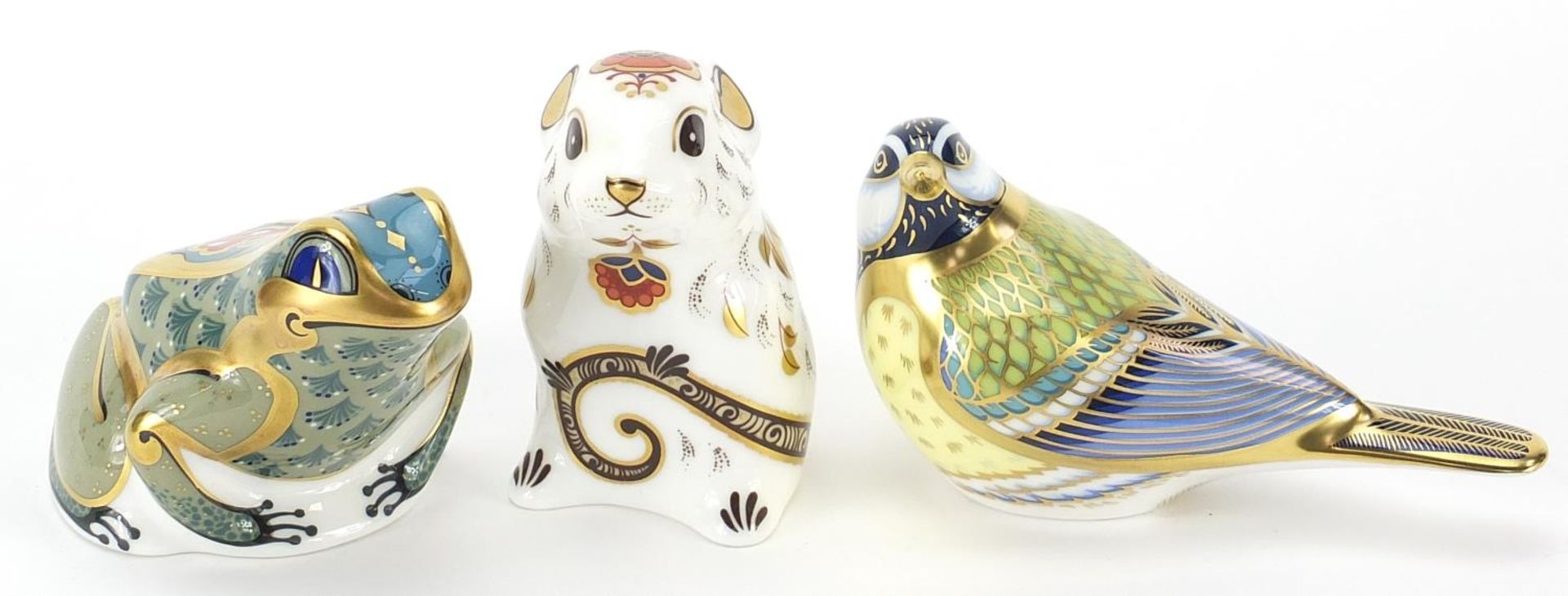 Three Royal Crown Derby paperweights with gold coloured metal stoppers comprising Mountain Frog,